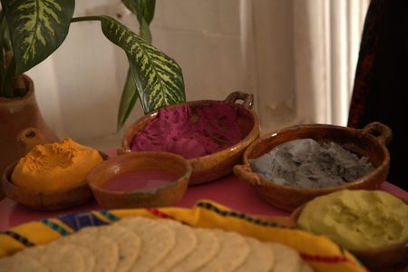 Colorful masa, or corn dough is displayed at El Comalote Restaurant in Antigua, Guatemala. The colors are created by the rich array of heritage grains used here to make tortillas and other corn-based foods. The restaurant and tortillerÌa uses locally sourced and heritage ingredients. (National Geographic/Adnelly Marichal)