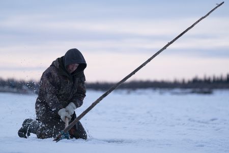 Chip Hailstone installs fish nets under the ice to catch whitefish. (BBC Studios Reality Productions, LLC/Dwayne Fowler)