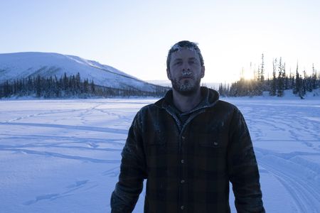 Johnny Rolfe in sub-zero temperatures, field dressing a caribou. (BBC Studios Reality Productions, LLC/Tyler Colgan)