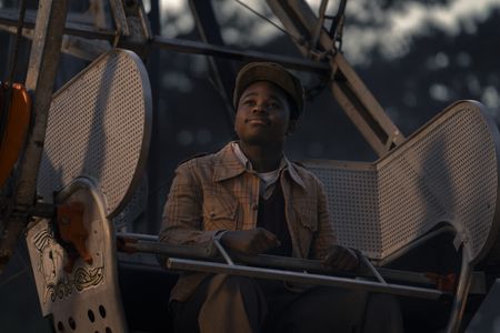 A teen Martin Luther King Jr., played by Jalyn Hall, rides the ferris wheel at the fair in GENIUS: MLK/X. (National Geographic/Richard DuCree)