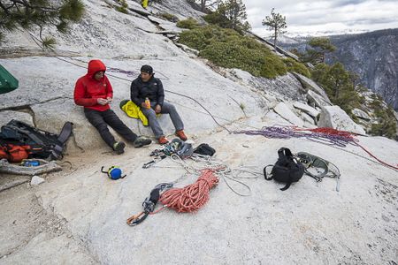 Alex Honnold and Jimmy Chin enjoy their last few hours together atop the summit of Freerider on El Capitan in Yosemite National Park. The production has come to an end and they are soon hiking down to the valley floor. (National Geographic/Samuel Crossley)