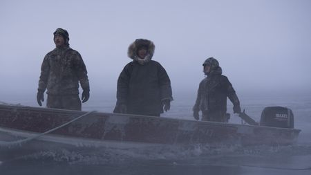 Chris, Daniel and Ala Apassingok seal hunting. (National Geographic/Zach Clanton)