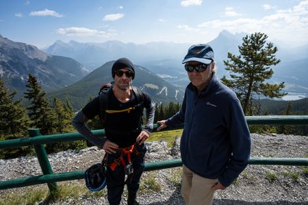 Joseph and Ranulph Fiennes stand near the Via Ferrata at Mount Norquay. Sir Ranulph Fiennes, "the greatest living explorer," and his cousin, actor Joseph Fiennes, revisit Ran’s 1971 expedition of Canada’s British Columbia.