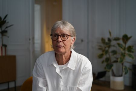 Claude Marie poses for a portrait for "Killer Lies: Chasing a True Crime Con Man," a documentary series about obsession and deception, following the unraveling of Stephane Bourgoin’s career as a best-selling author and serial killer expert. (National Geographic/Ben Selkow)