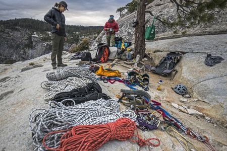 The crew sort and pack up all the ropes and climbing equipment used to document Alex Honnolds free solo climb of El Capitan's Freerider in Yosemite National Park. (National Geographic/Jimmy Chin)