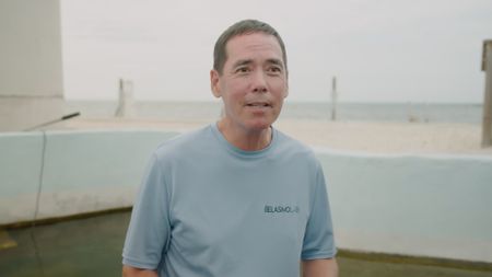 Stephen Kajiura, expert, explaining to camera how and why Bonnethead sharks are the perfect species of shark to use for the study of demonstrating tonic immobility on camera.  (National Geographic)
