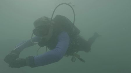 Geoarchaeologist Beverly Goodman is pictured during a exploratory dive off the coast of Caesarea in Caesarea, Israel. (Windfall Films)