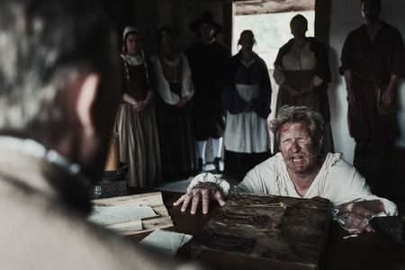 Diedtrich Flade at court. On his knees and pleading for his life after being accused of witchcraft. (Dash Productions Services LTD/Antoan Ivanov)