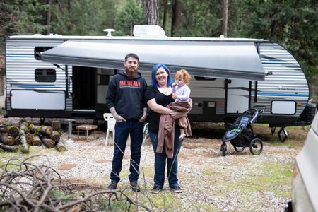 Magalia, CA - The Cox Family in front of their trailer. (National Geographic/Lincoln Else)