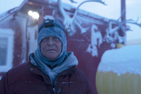 Sue Aikens checks her camp and installs safety precautions during a winter storm. (BBC Studios Reality Productions, LLC/Jayce Kolinski)