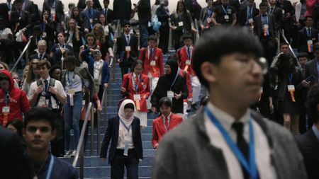 ISEF students walking down stairs after judging.  (National Geographic)