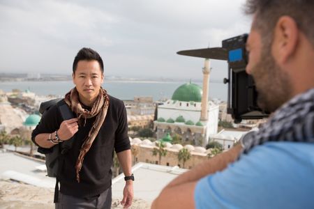 Acre, Israel - Crew member (R) films Dr. Albert Lin on an Old City rooftop in Acre, Israel. (Blakeway Productions/National Geographic)