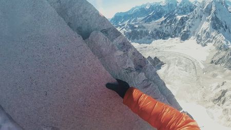 Point of view of David Lama high up as he climbs Lunag Ri, in the Himalayas.  (Mandatory credit: Red Bull Media House)