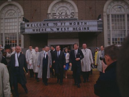 President John F. Kennedy exits the Texas Hotel to speak to a crowd of supporters waiting for him in the rain, in Fort Worth, Texas in Nov. 1963. (John F. Kennedy Presidential Library and Museum, Boston)