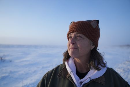 Sue Aikens hunts for ptarmigan in the tundra during the winter season for subsistence food. (BBC Studios Reality Productions, LLC/Jayce Kolinski)