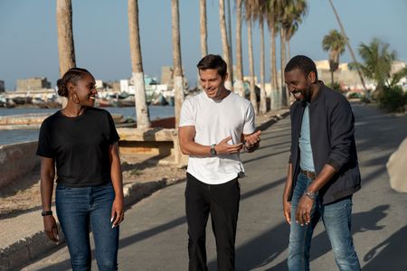 Issa Rae, Antoni Porowski and Abdou Karim Fall meet in Saint-Louis. (National Geographic/John Wendle)