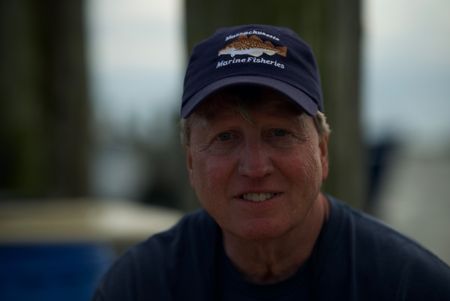 Dr. Greg Skomal on a pier in Martha Vineyard. (National Geographic/Brandon Sargeant)