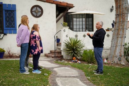 The Luhm family meets with Cesar outside their home. (National Geographic)