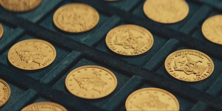 A case displaying gold coins is pictured on board the ship off the coast of North Carolina. In 1989, maverick scientist Tommy Thompson, stuns the world by recovering three tons of gold from a shipwreck deep in the Atlantic Ocean. What follows is a 30-year story of adventure, deception, and personal turmoil, taking him from venerated celebrity to infamous fugitive, and finally a defiant prisoner who refuses to give up his gold. (Recovery Limited Partnership Liquidating Trust)