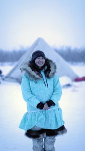 Qutan Hailstone ice fishing with her family. (BBC Studios Reality Productions, LLC/Pedro Delbrey)