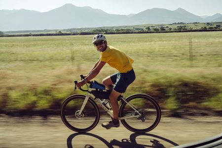 Alex Honnold biking during the Devils Thumb expedition that included biking, hiking, sailing and climbing. They rode just shy of 2,300 and the expedition took 55 days.  (National Geographic/Taylor Shaffer)