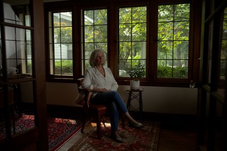 Company Treasurer and Ops Manager Paula Steele is pictured in a portrait made during the production of "Cursed Gold: A Shipwreck Scandal." In 1989, maverick scientist Tommy Thompson, stuns the world by recovering three tons of gold from a shipwreck deep in the Atlantic Ocean. What follows is a 30-year story of adventure, deception, and personal turmoil, taking him from venerated celebrity to infamous fugitive, and finally a defiant prisoner who refuses to give up his gold. (National Geographic)