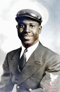 Clark Simmons is seen in close-up portrait. "Erased: WW2's Heroes of Color" tells the stories of three Black heroes who miraculously survived the attack on Pearl Harbor. One of these men was Clark Simmons, who served in the US Navy as mess attendant on the USS Utah. (Family of Clark Simmons/Claudette Simmons)