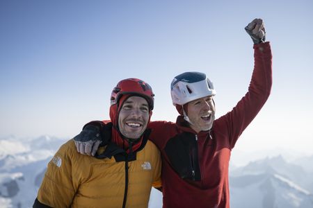 Alex Honnold and Tommy Caldwell celebrating on top of the Devil's Thumb.  (National Geographic/Renan Ozturk)