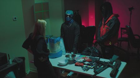 Mariana interviews Chip and Playboi in a trap house. (Photo credit: National Geographic)