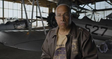 President and CEO of the Tuskegee Airmen National Museum Dr. Brian R. Smith sits for an interview at the Museum in Detroit.  (National Geographic)