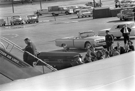President John F. Kennedy's casket is carried onto Air Force One at Love Field in Dallas, Nov. 22, 1963. Onlookers include Lawrence O'Brien, General Clifton, Jacqueline Kennedy, Kenneth O'Donnell, Dave Powers, and Evelyn Lincoln. (Cecil Stoughton/White House Photographs/John F. Kennedy Presidential Library and Museum, Boston)