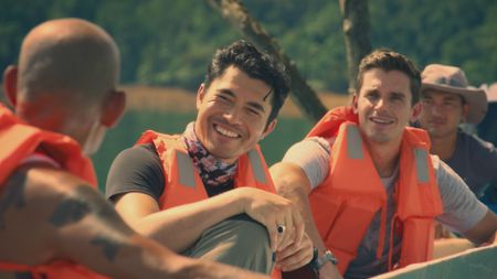 Peter, Henry Golding, Antoni Porowksi and Fraser on a boat in Batang Ai. (National Geographic)