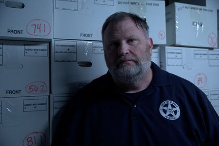 Veteran US Marshal Mark Stroh is pictured in a portrait made during the production of "Cursed Gold: A Shipwreck Scandal." In 1989, maverick scientist Tommy Thompson stuns the world by recovering three tons of gold from a shipwreck deep in the Atlantic Ocean. What follows is a 30-year story of adventure, deception, and personal turmoil, taking him from venerated celebrity to infamous fugitive, and finally a defiant prisoner who refuses to give up his gold. (National Geographic)