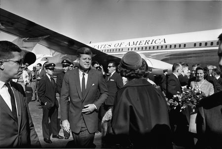 Paul Landis (far left) is pictured standing near President John F. Kennedy and first lady Jaqueline Kennedy, as they arrive at Love Field in Dallas, Nov. 22, 1963.  (Dallas Times Herald Collection/The Sixth Floor Museum at Dealey Plaza)