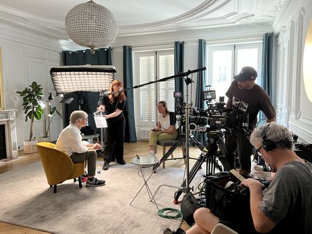 In this behind-the-scenes photo, Claude Marie is interviewed for "Killer Lies: Chasing a True Crime Con Man," a documentary series about obsession and deception, following the unraveling of Stephane Bourgoin’s career as a best-selling author and serial killer expert. (National Geographic/Ben Selkow)