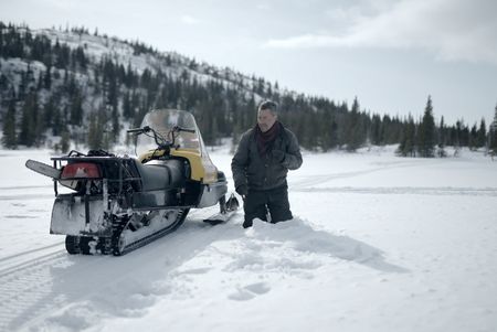 Joel Jacko traveling towards the frozen lake to hunt seals. (National Geographic/Wayne Shockey)