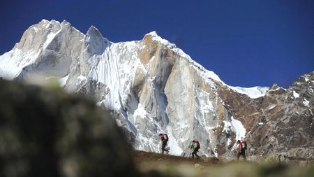 Jimmy Chin (center) begins to climb Meru, in the Himalayas, with Renan Ozturk (left) and Conrad Anker (right).  (credit: Meru Film)