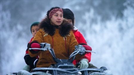 Iriqtaq Hailstone drives her mother Agnes, and son Wade to deliver his first ptarmigan catch to an Elder. (BBC Studios/Dwayne Fowler)