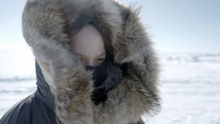 Jaxon Hoffman ice fishing in the winter season. (BBC Studios Reality Productions, LLC/Brian Bitterfeld)