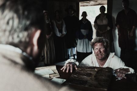 Diedtrich Flade at court. On his knees, and pleading for his life after being accused of witchcraft. (Dash Productions Services LTD/Antoan Ivanov)