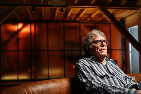 French film critic, author, filmmaker and actor Jean-Pierre Bouyxou poses for a portrait for "Killer Lies: Chasing a True Crime Con Man," a documentary series about obsession and deception, following the unraveling of Stephane Bourgoin’s career as a best-selling author and serial killer expert. (National Geographic/Ben Selkow)