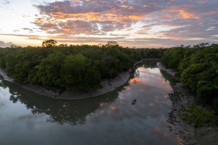 The sun rises near the mouth of the Amazon River. (credit: National Geographic/Pablo Albarenga)