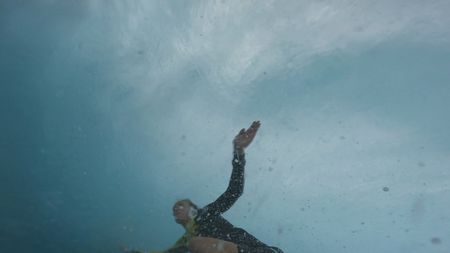 Justine Dupont surfs inside the tube of a giant wave.  (Mandatory photo credit: Justine Dupont)