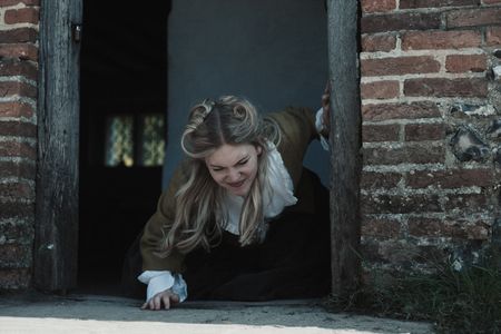 Mary Dunbar keels over in pain as she attempts to leave her house. (Dash Productions Services LTD/Antoan Ivanov)