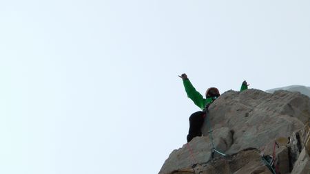 Jimmy Chin cheers on top of Meru, in the Himalayas.  (credit: Meru Film)