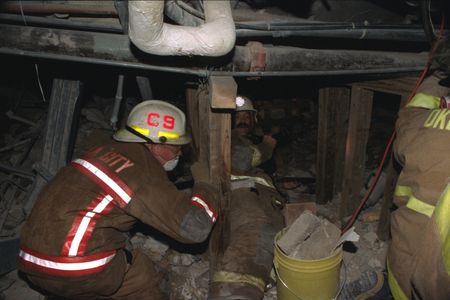 District Fire Chief Mike Shannon and Assistant Chief Jon Hansen are pictured inside the bombed Alfred P. Murrah Federal Building, April 1995, in Oklahoma City, Okla. (Danny Atchley)