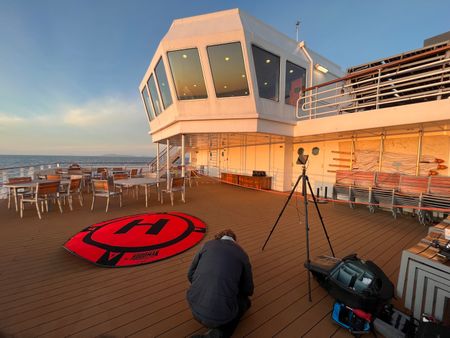 Drone Operator Raphael Boudreault-Simard on the deck of the expedition ship. (National Geographic for Disney/Ruth Davies)