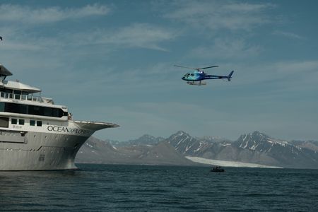 The Helo comes in for landing on the OceanXplorer off the coast of Svalbard. (National Geographic/Mario Tadinac)