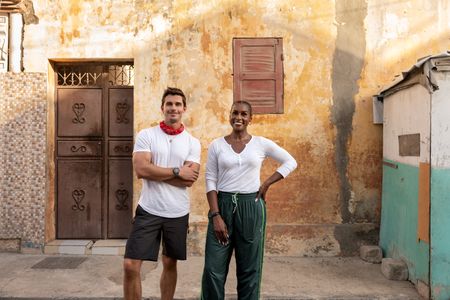 Antoni Porowski and Issa Rae outside Mama Yacine's house in Saint-Louis, Senegal. (National Geographic/John Wendle)