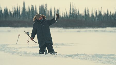 Gilbert catches a fish. (Blue Ant Media/Tara Elwood)